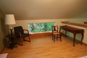 Photo of desk area in loft at the Holly House at Hypatia-in-the-Woods